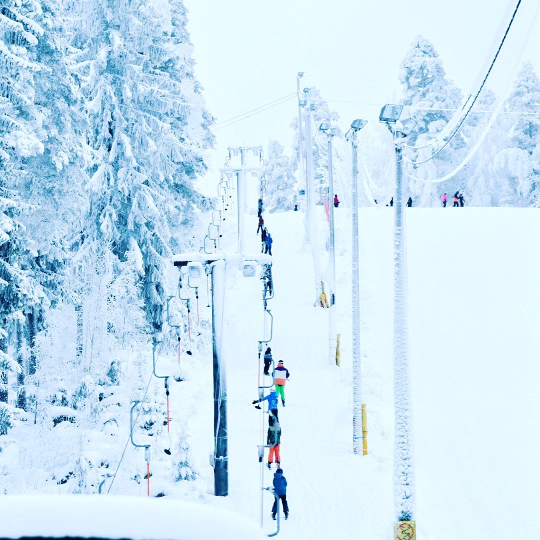 People on a ski lift at the Äänemäki ski slope.